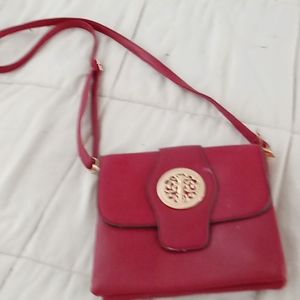 Women's maroon & gold purse